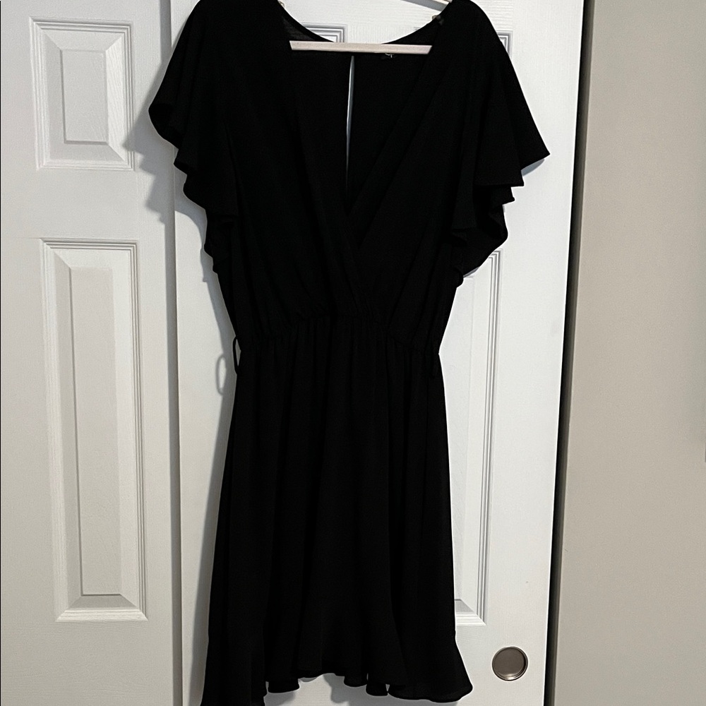 Elegant Black Mini Dress with Ruffle Sleeves